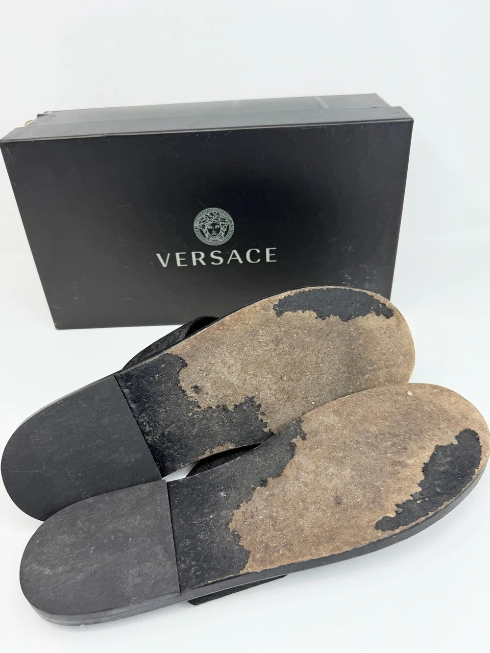 Versace Black Thong Sandals with Gold Medusa Accent